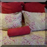 D74. Pottery Barn green and red floral bedding including duvet and 2 shams ($50) and Pottery Barn red coverlet queen with 2 shams and bolster pillow ($75) 